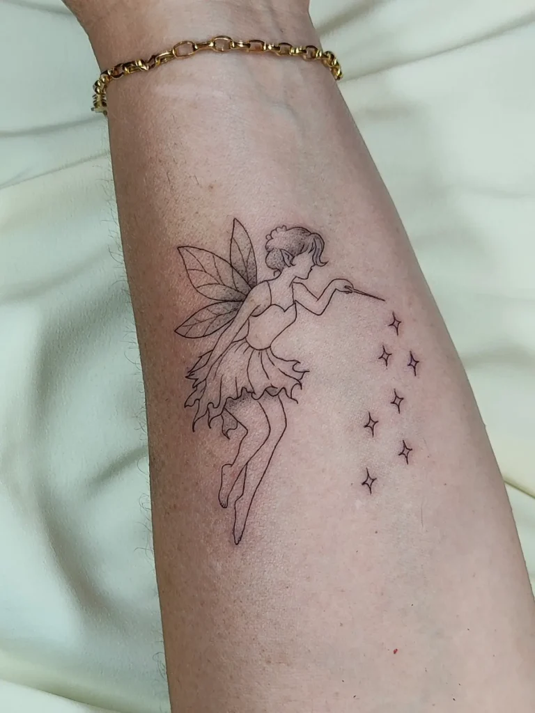 Tattoo hada con 7 estrellas